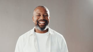 Portrait of a smiling African man customer